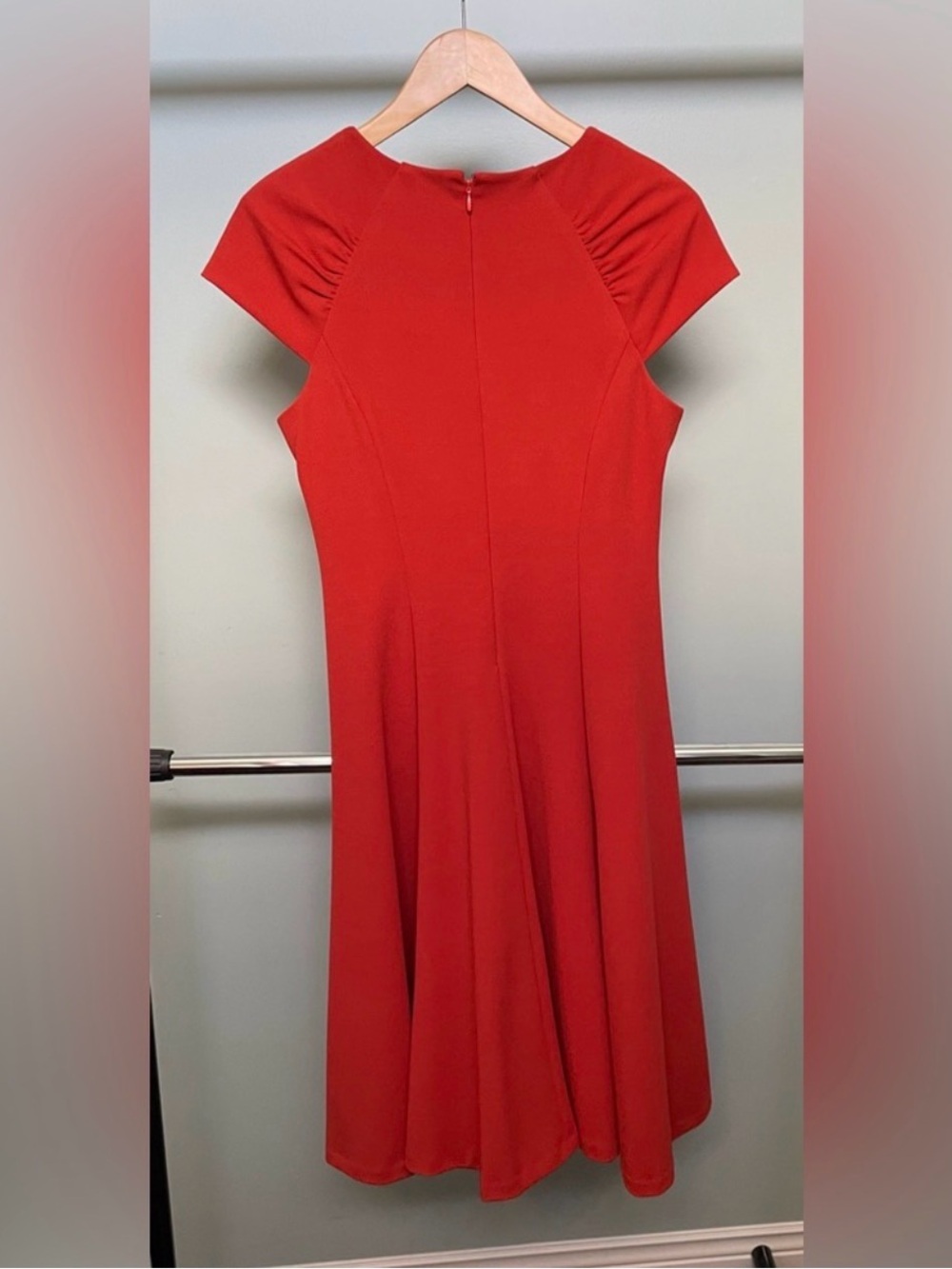 Calvin Klein orange dress.